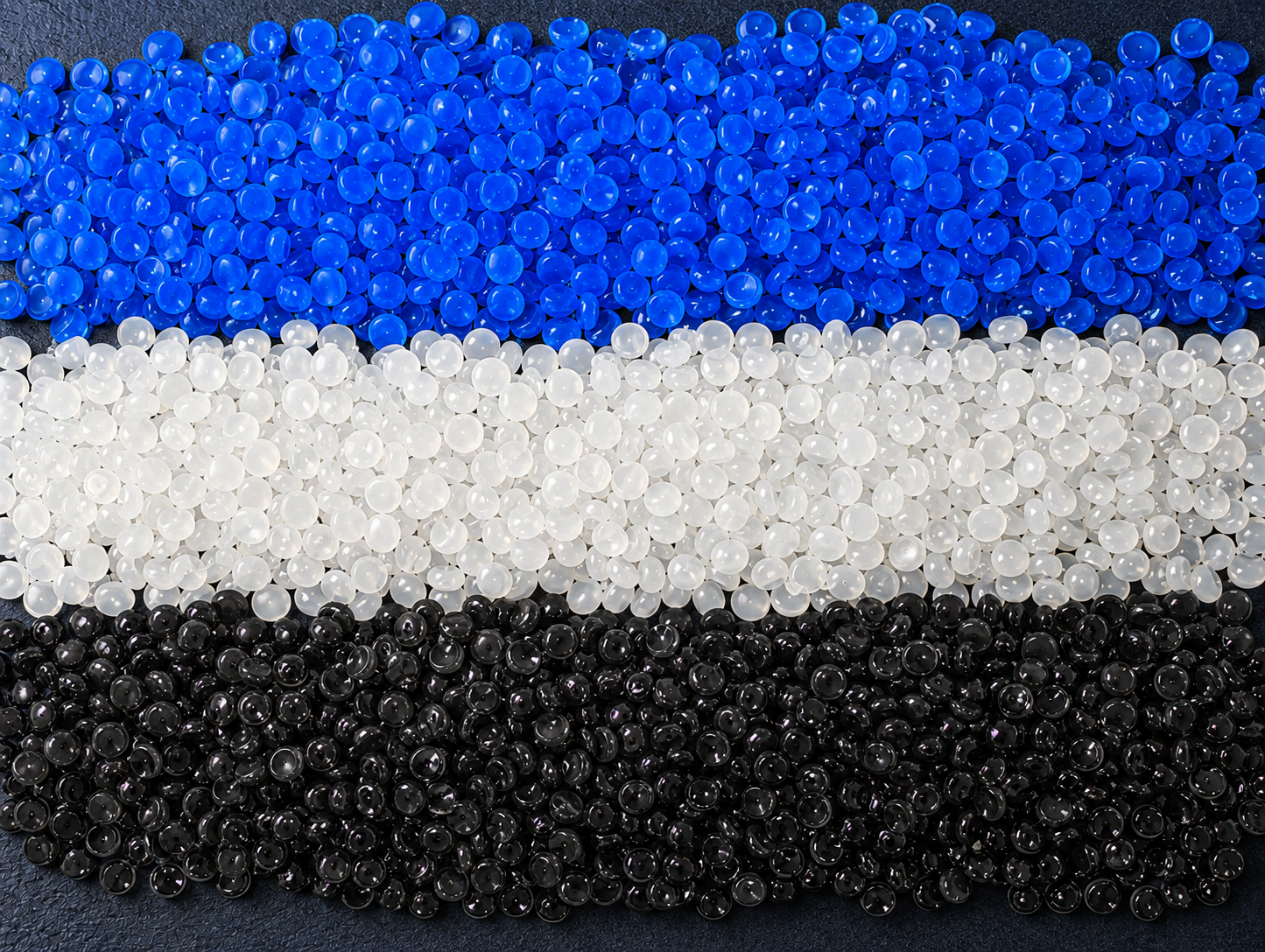 Blue, white and black polymer pellets from ELBE Trading America